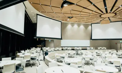 A Conference room with laid out tables